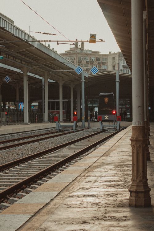Free A scenic view of a train station in Istanbul, capturing the architecture and ambiance at sunset. Stock Photo