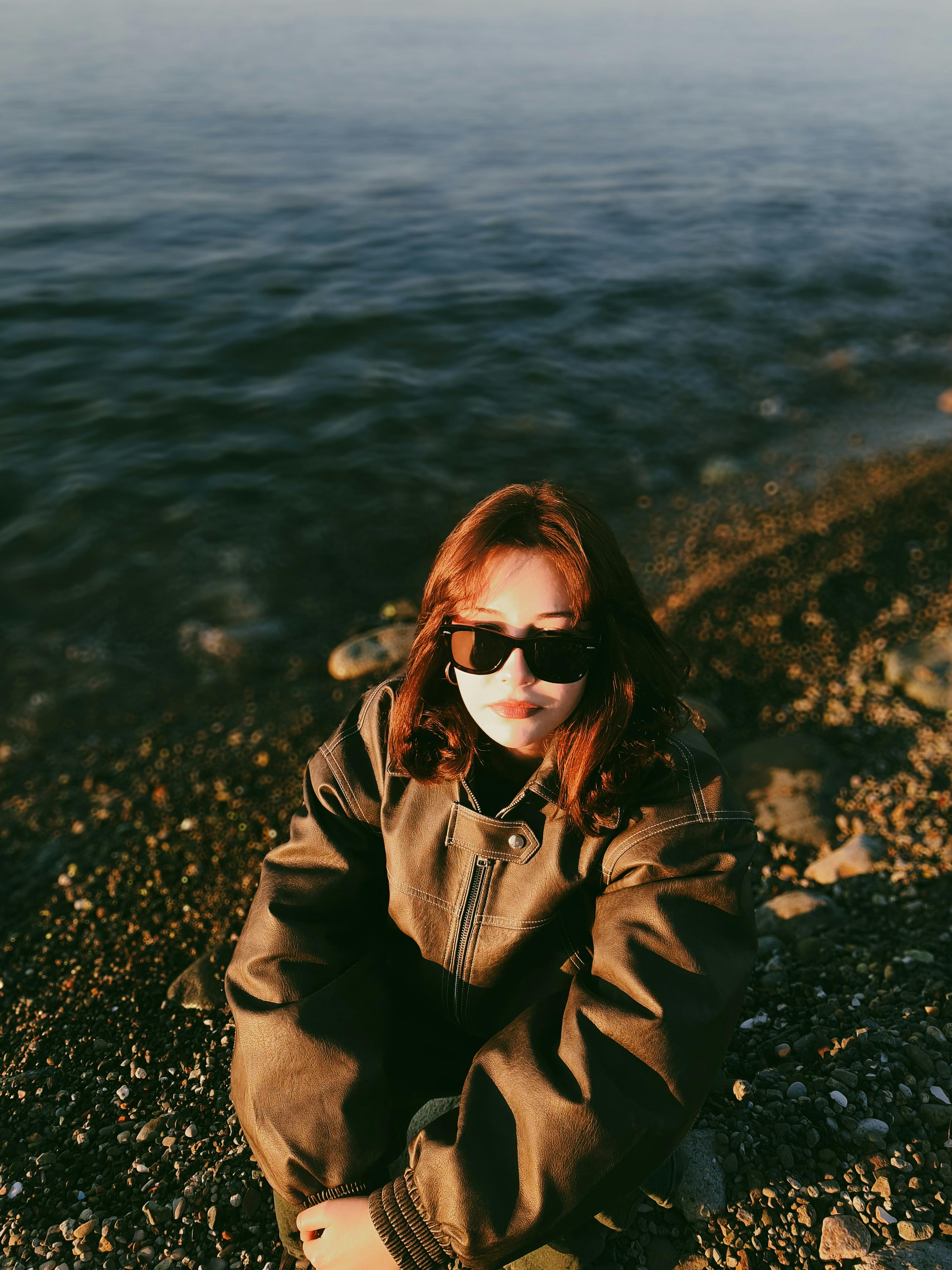 Woman Enjoying Sunset by Rize Beach in Türkiye · Free Stock Photo
