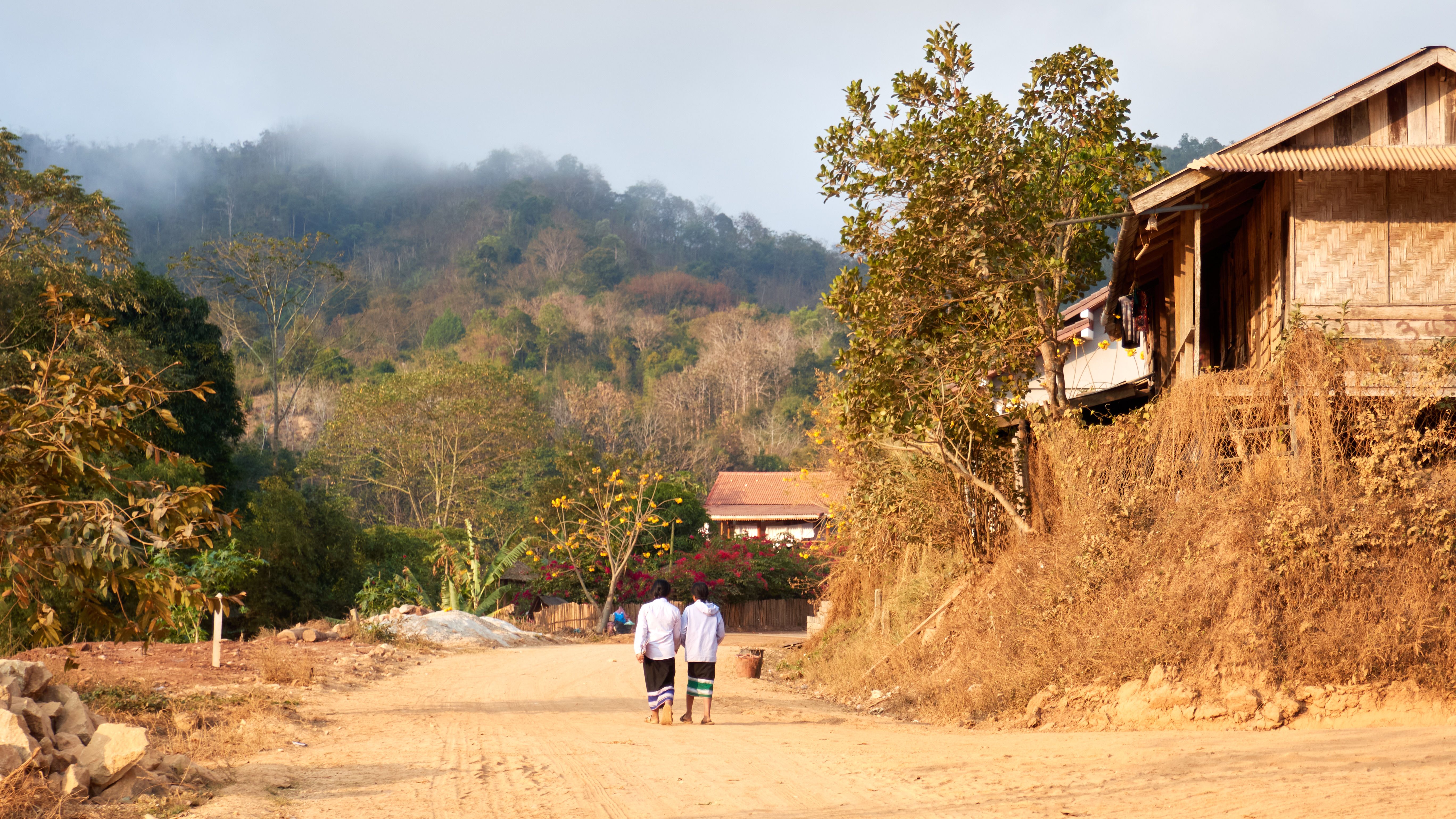 Children Walking on a Rural Road in Laos · Free Stock Photo
