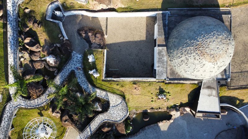 Aerial view of pathways radiating outward from a domed plaza structure