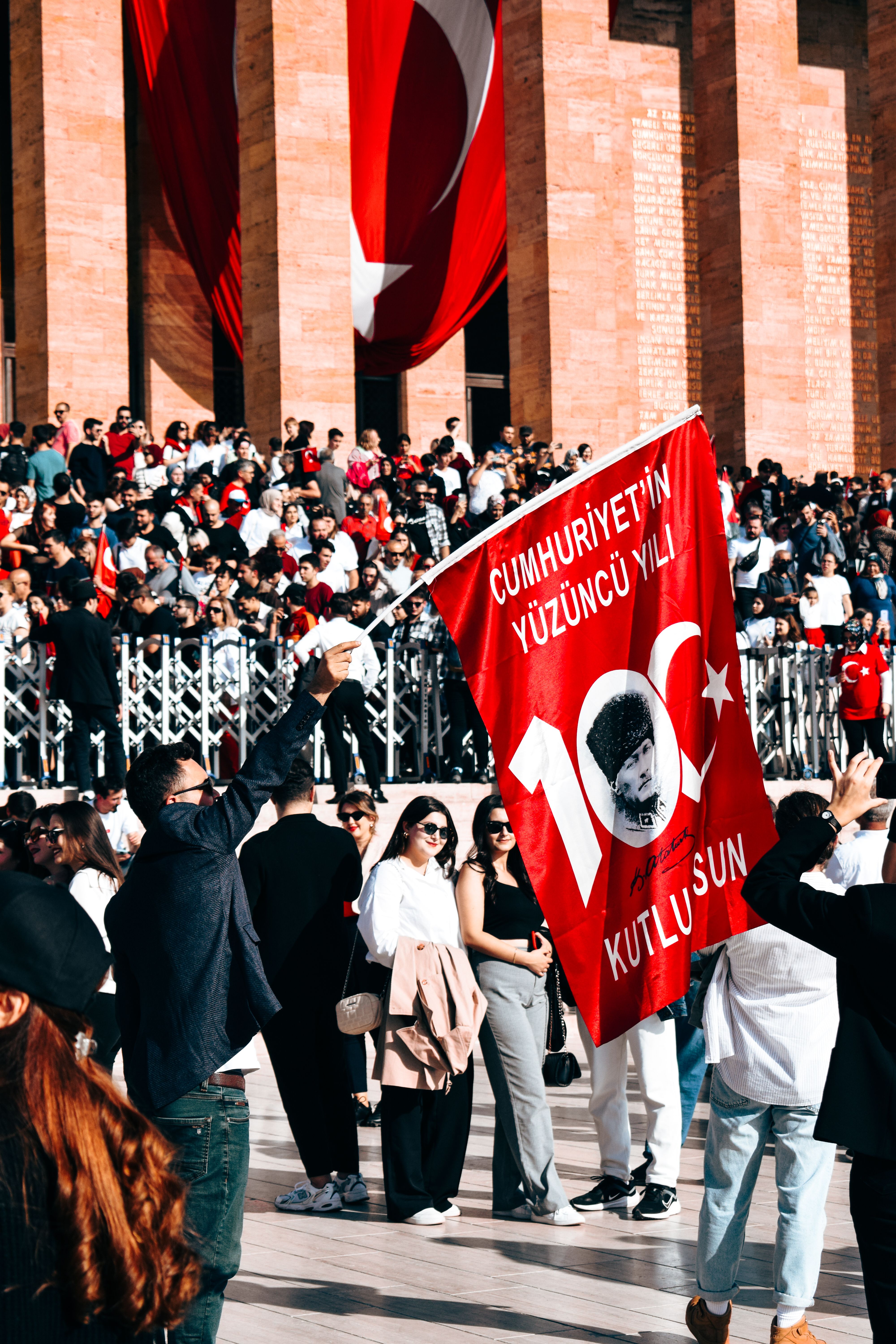 People celebrate the 100th anniversary at Anıtkabir in Ankara, Türkiye.