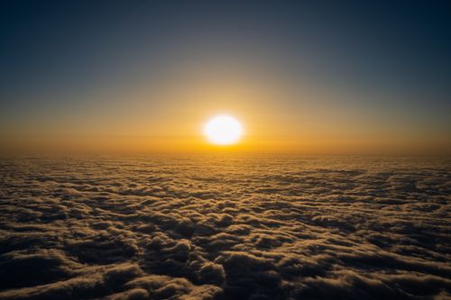 Free A striking sunrise over a blanket of clouds in Leshan, China, capturing the beauty of nature. Stock Photo