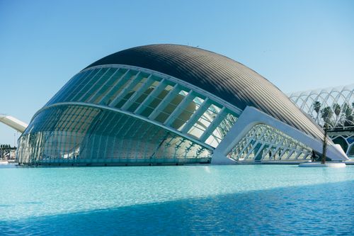 Free Stunning view of the futuristic L'Hemisfèric building in Valencia, Spain, with its unique design and reflection in water. Stock Photo