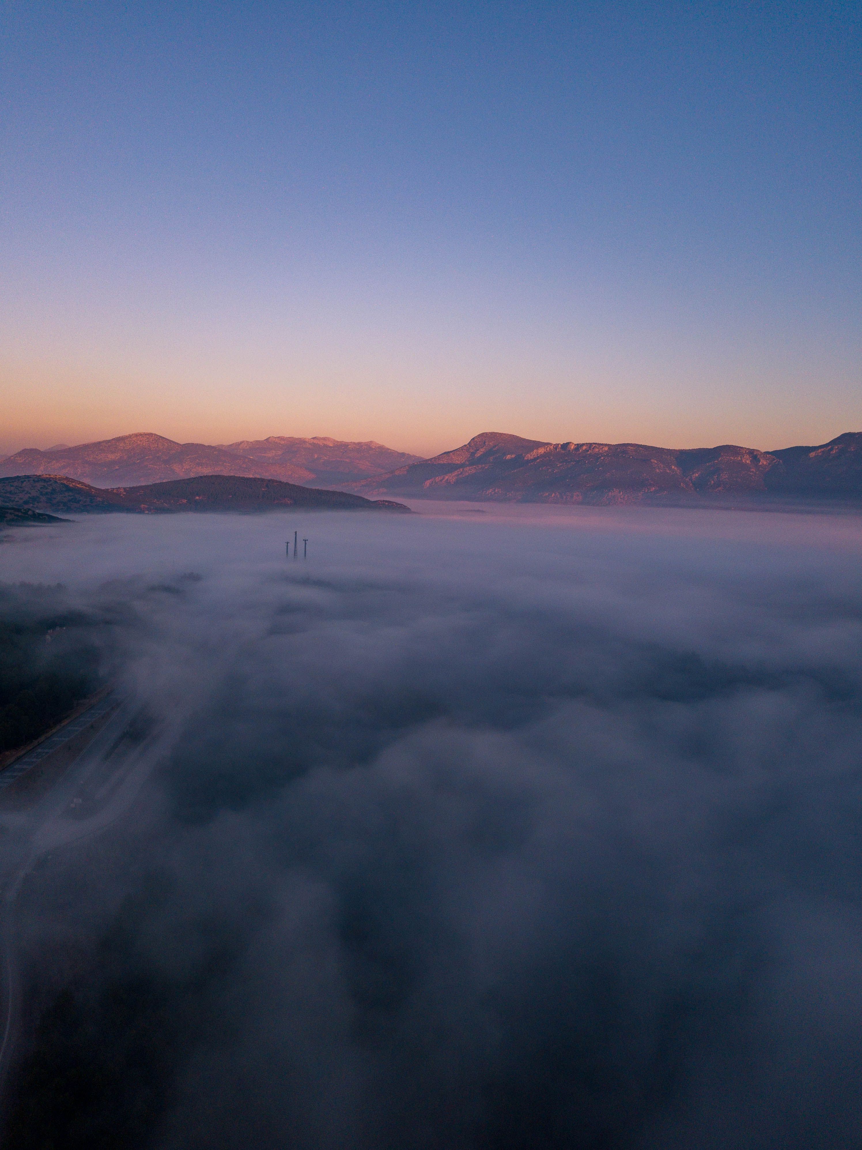 A beautiful sunrise over foggy mountains in Bucak, Türkiye, captured from above.. pexels, beautiful, sunrise