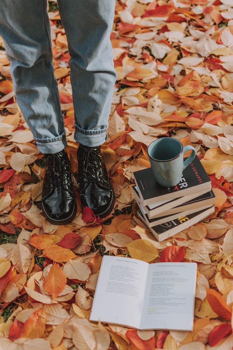 Person Wearing Black Leather Boots