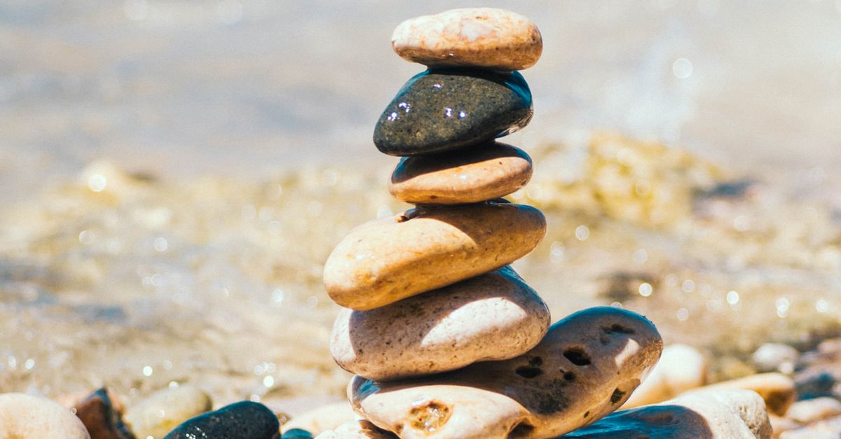 Blue Beach Rocks Stacked Balanced Rock Stack on Tranquil Beach · Free Stock Photo