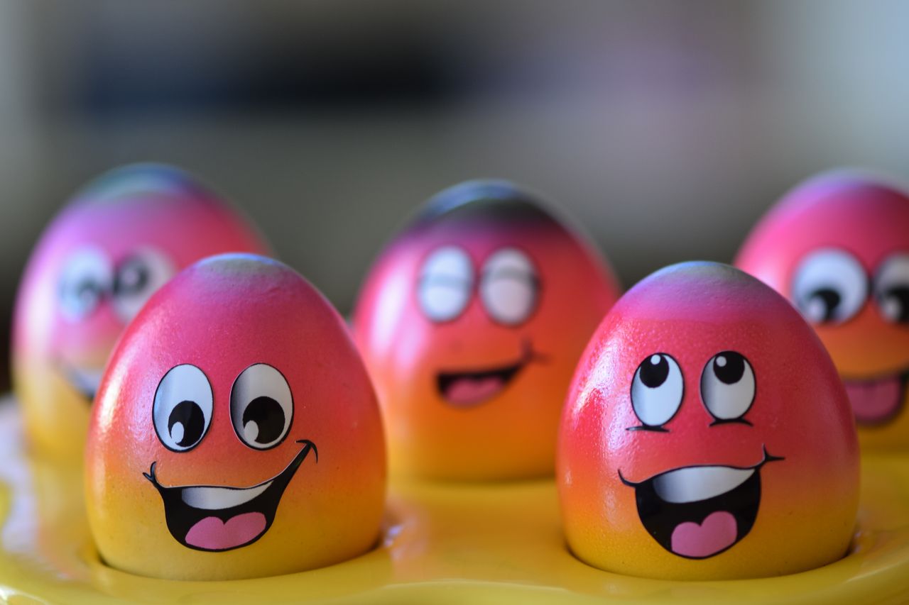 vibrant easter eggs decorated with cheerful smiling faces perfect for