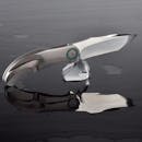 Sleek Modern Knife with Reflection on Water