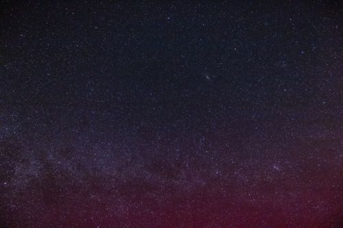 Free A breathtaking view of the star-filled night sky over Bergerac, France, showcasing the Milky Way. Stock Photo