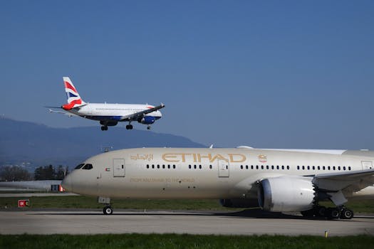 A British Airways and Etihad airplane at Geneva Airport on a clear day.