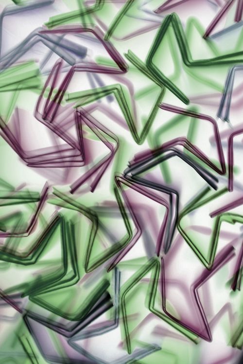 Free Dynamic abstract image of overlapping colorful star shapes creating a playful geometric pattern. Stock Photo