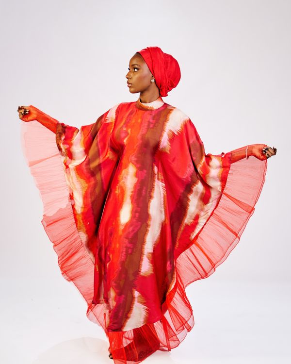 Elegant Woman in Vibrant Red Traditional Dress · Free Stock Photo