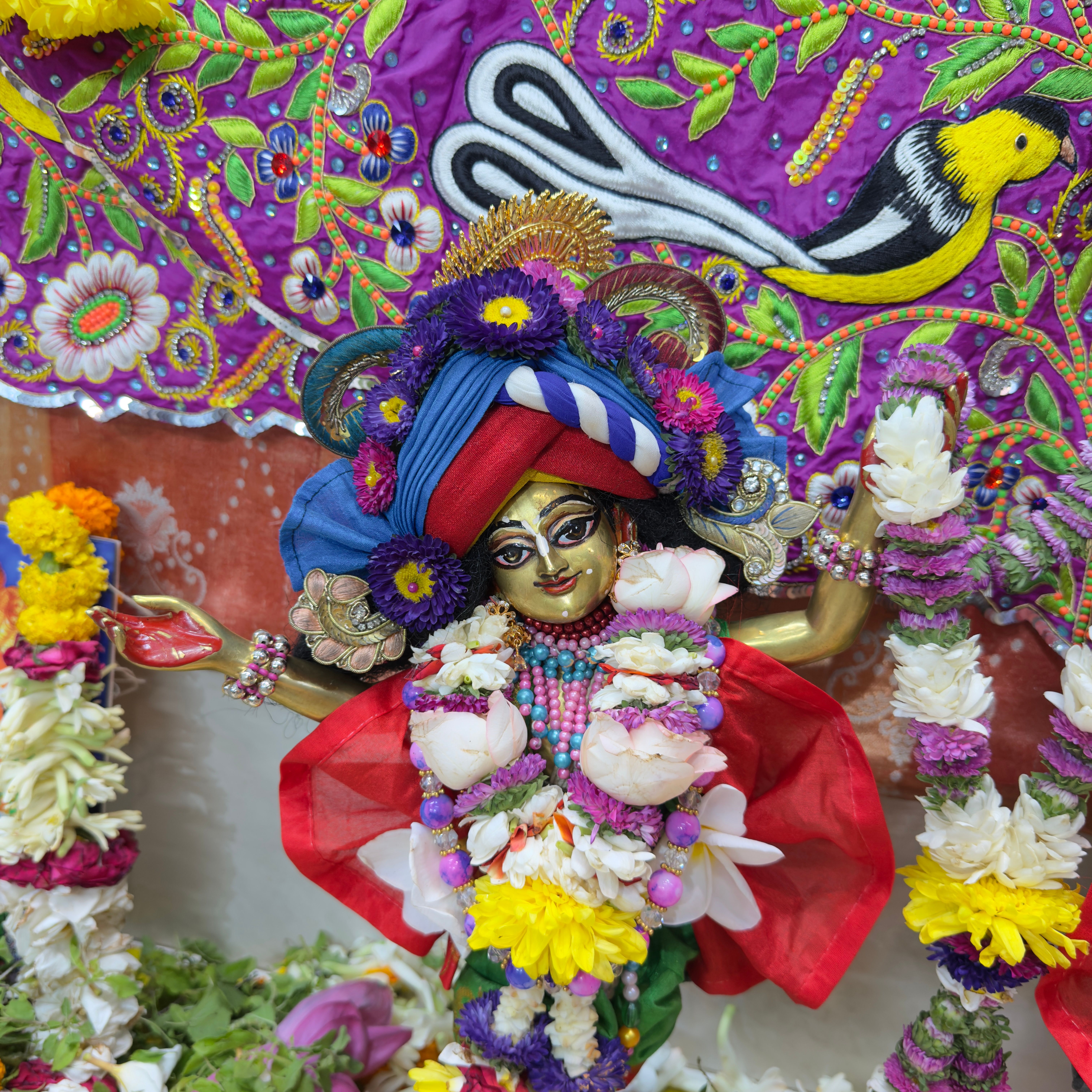 Flowers and a diya prepared for worship