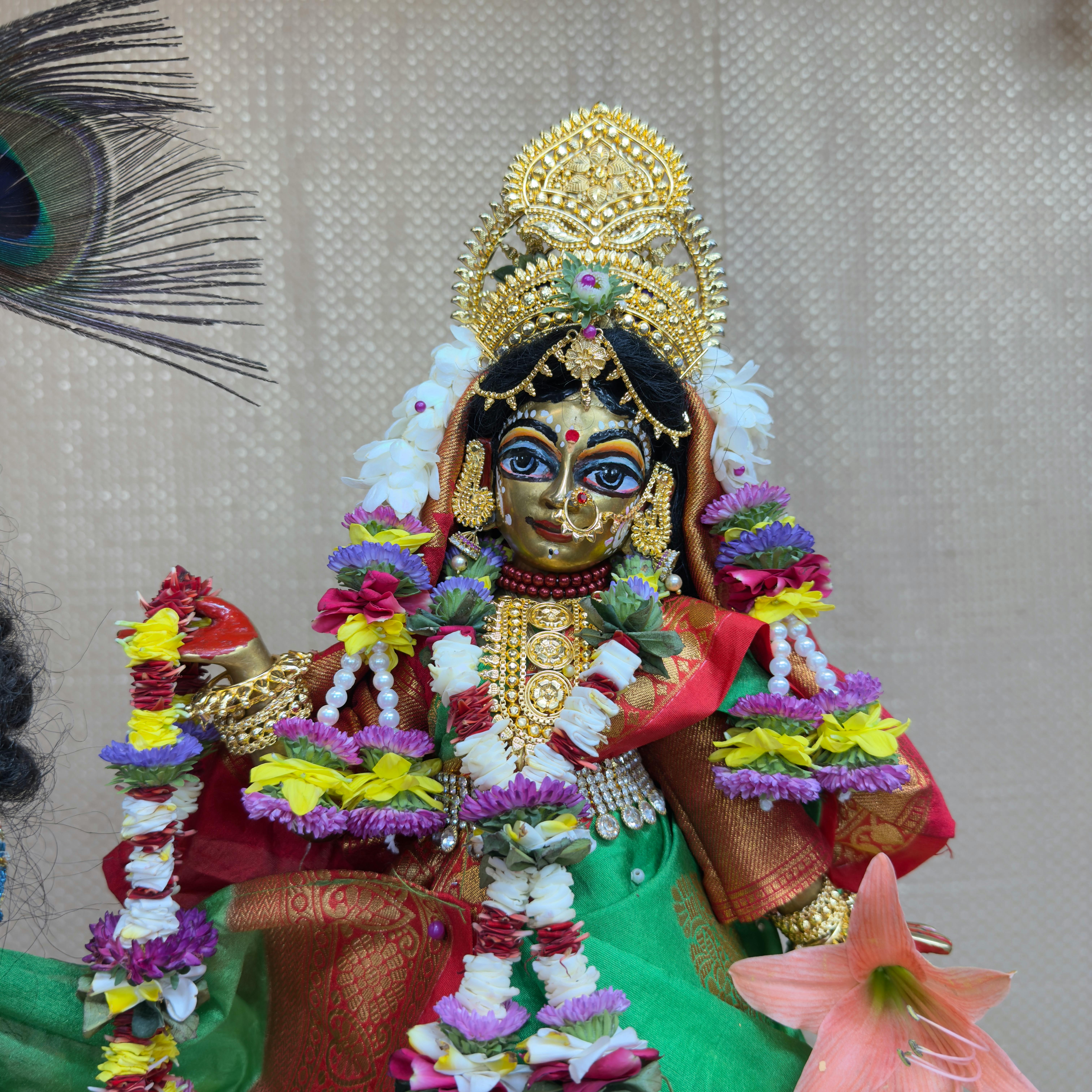 vibrant figurine of hindu deity with garland
