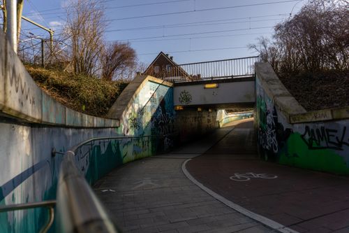 Free Graffiti-covered underpass in Kamen, NRW, Germany, showcasing urban architecture and street art. Stock Photo