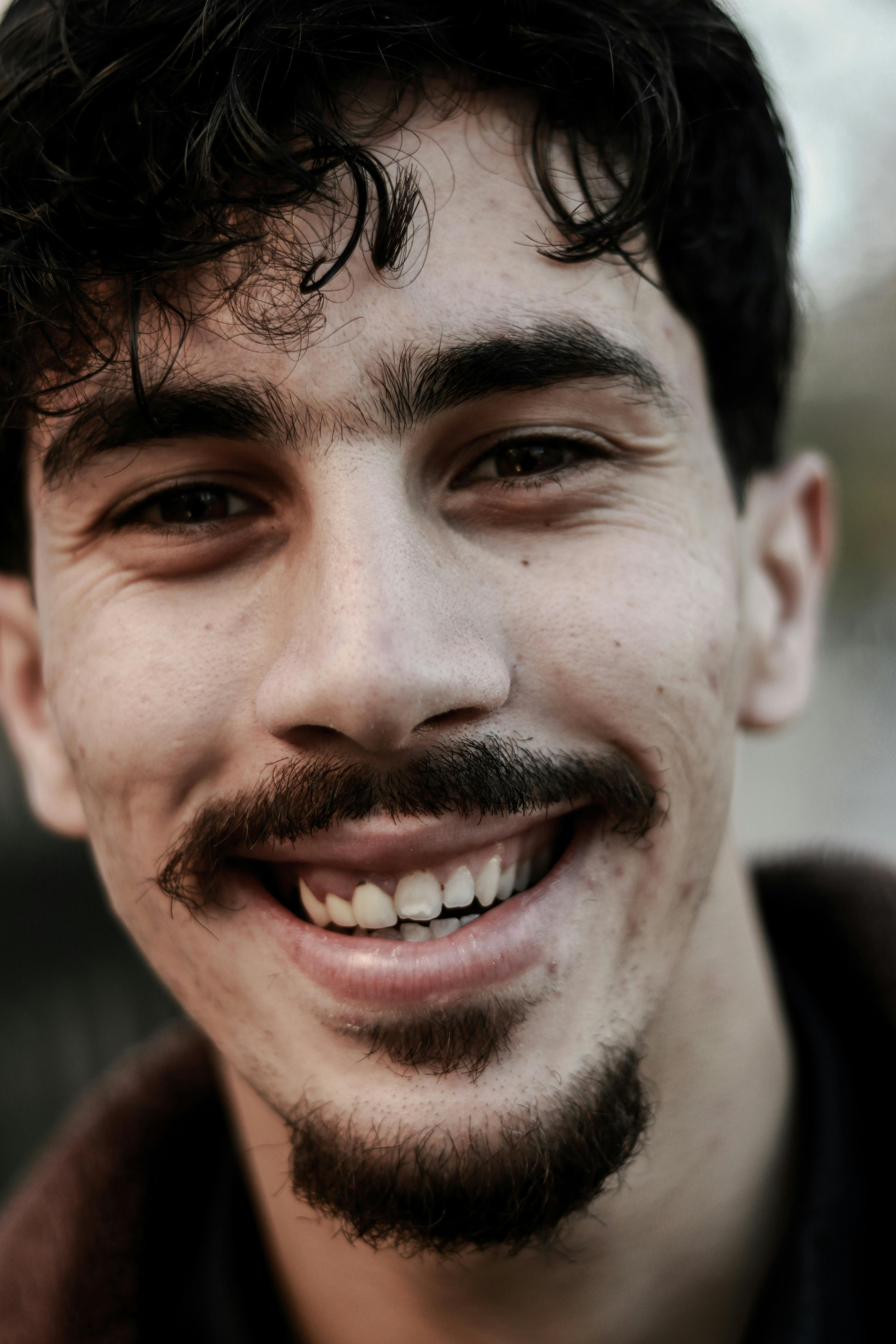 close up portrait of a smiling young man
