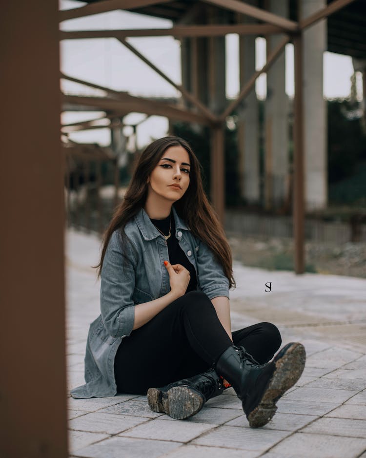 Woman Sitting On Floor