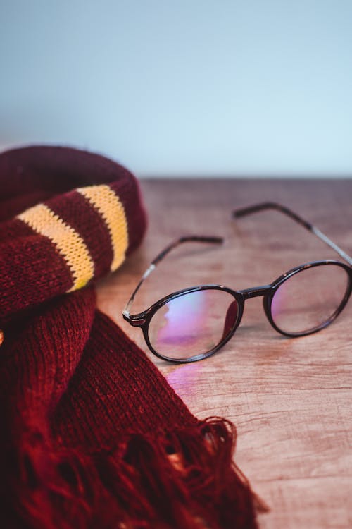 Scarf and Eyeglasses on the Table