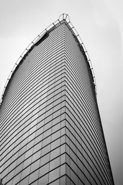 Free Black and white photo of modern skyscraper in Riga, Latvia. Tall and sleek. Stock Photo