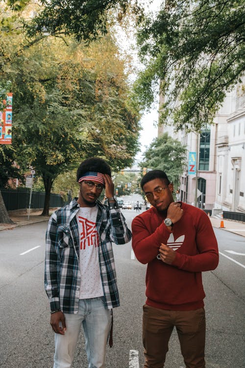 Men Standing on Road