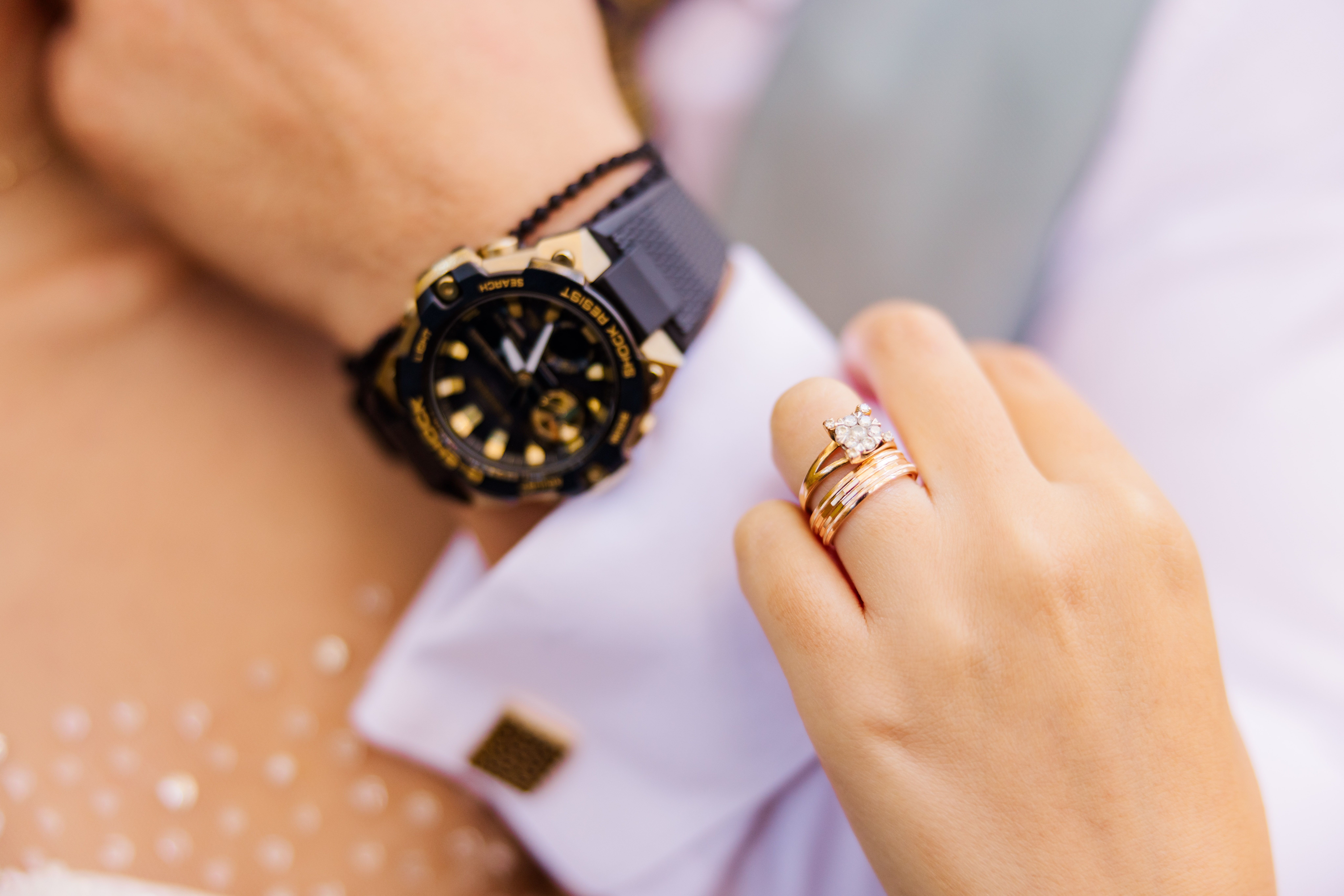 Elegant Wedding Rings and Luxury Watch Close-Up · Free Stock Photo