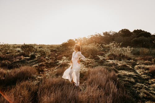 Free Woman Standing on Ground Stock Photo