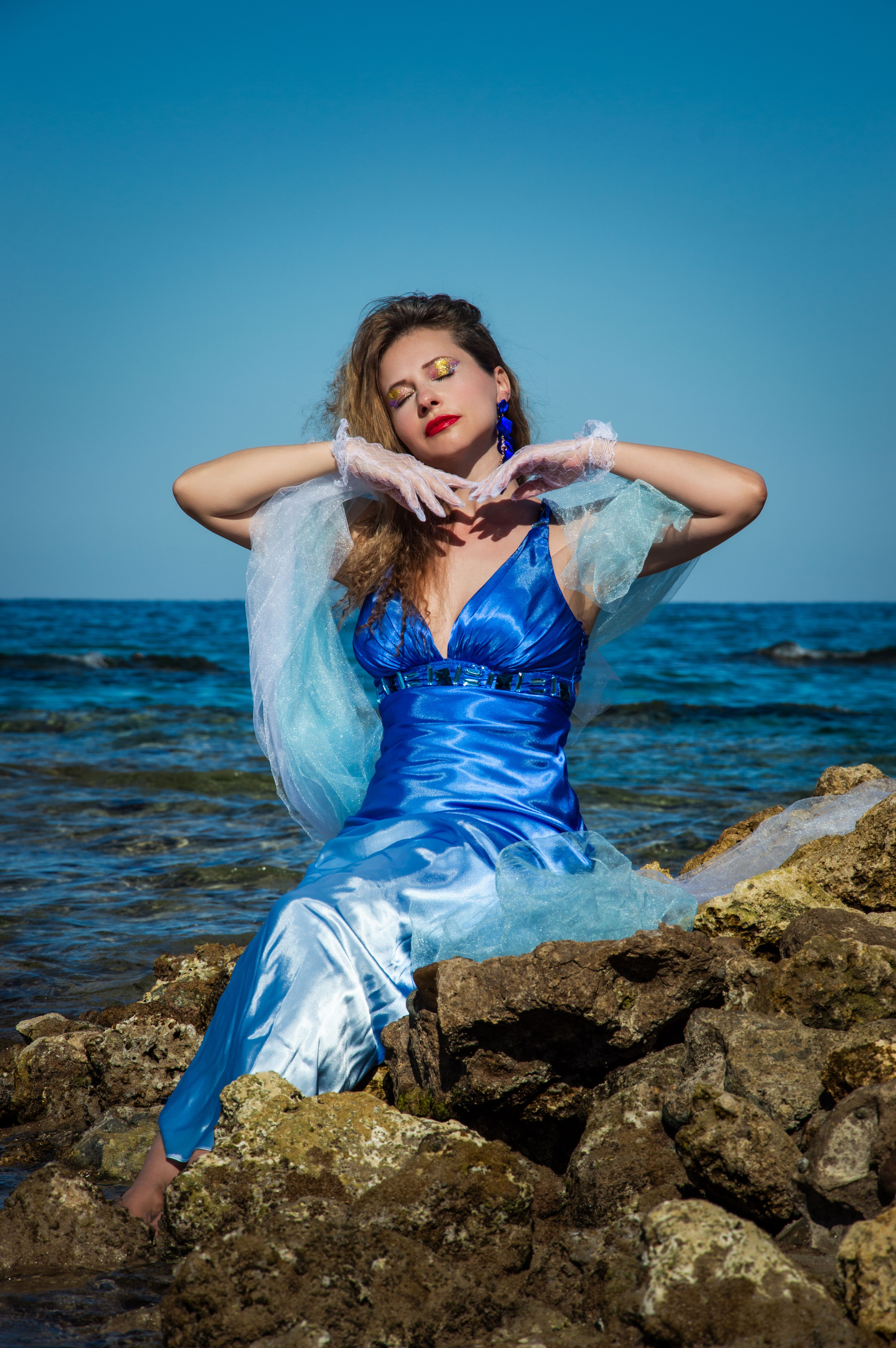 Woman Posing in a Blue Dress · Free Stock Photo