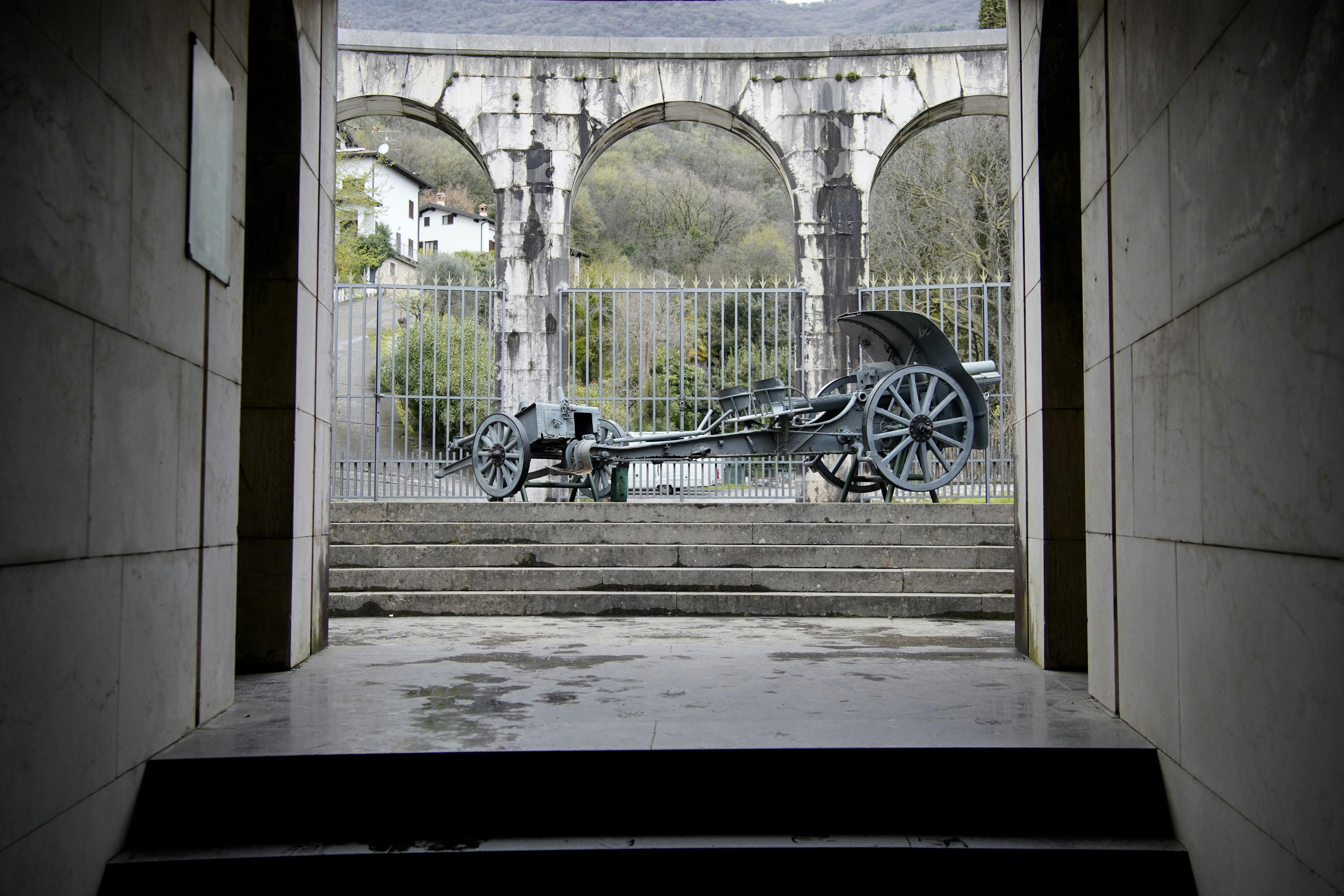 historic cannon at military memorial in italy