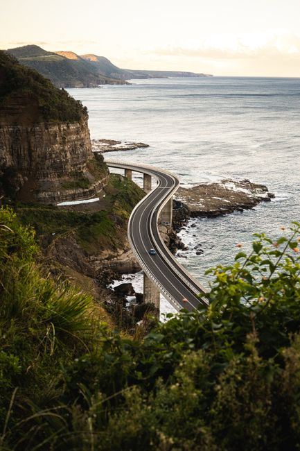 Stunning view of the Sea Cliff Bridge winding along the coast in Sydney, Australia.