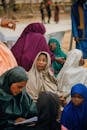 Group of Women in Traditional Attire Outdoors