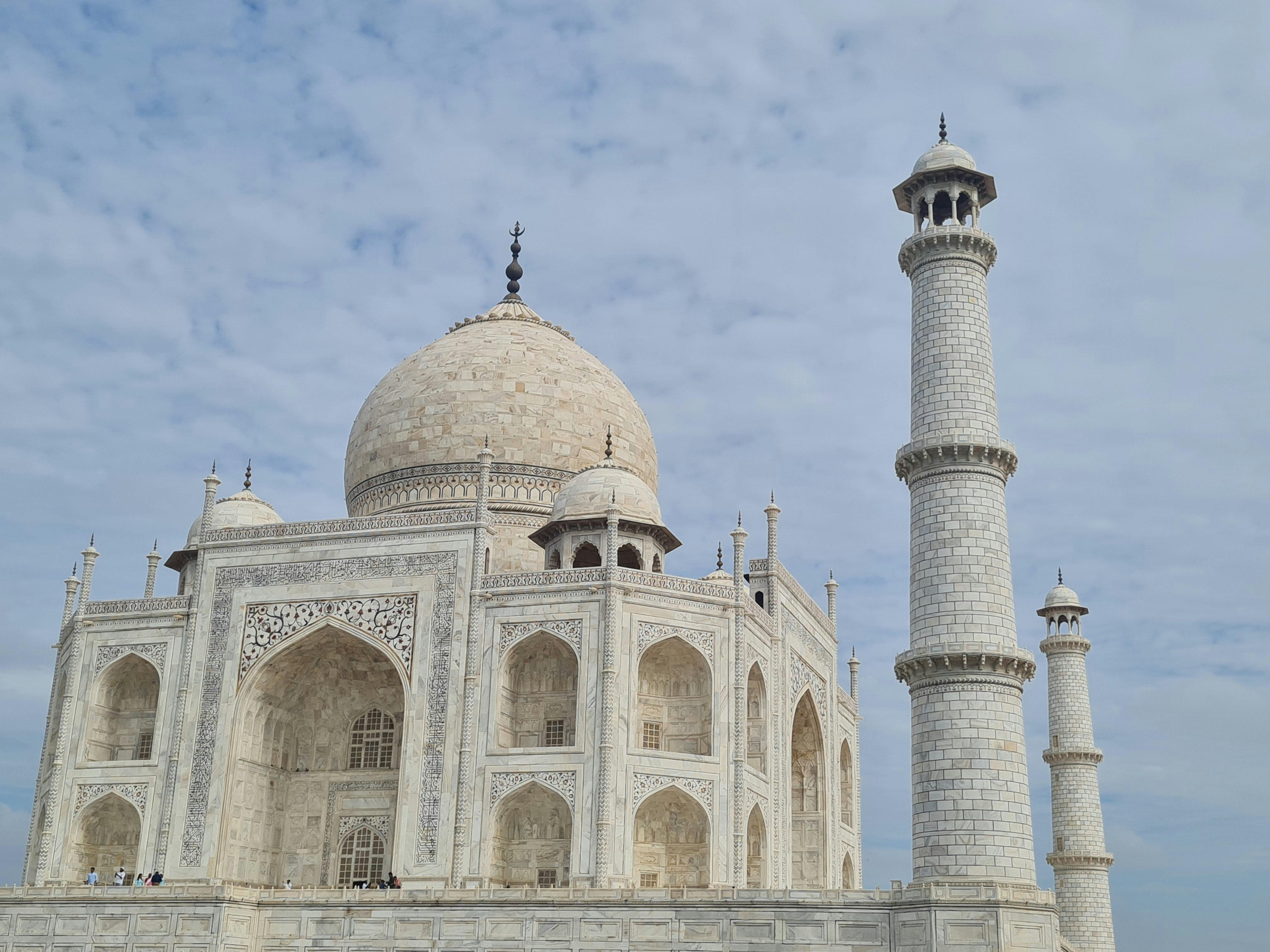 Free Stunning image of the Taj Mahal with clear blue skies highlighting its architectural grandeur. Stock Photo