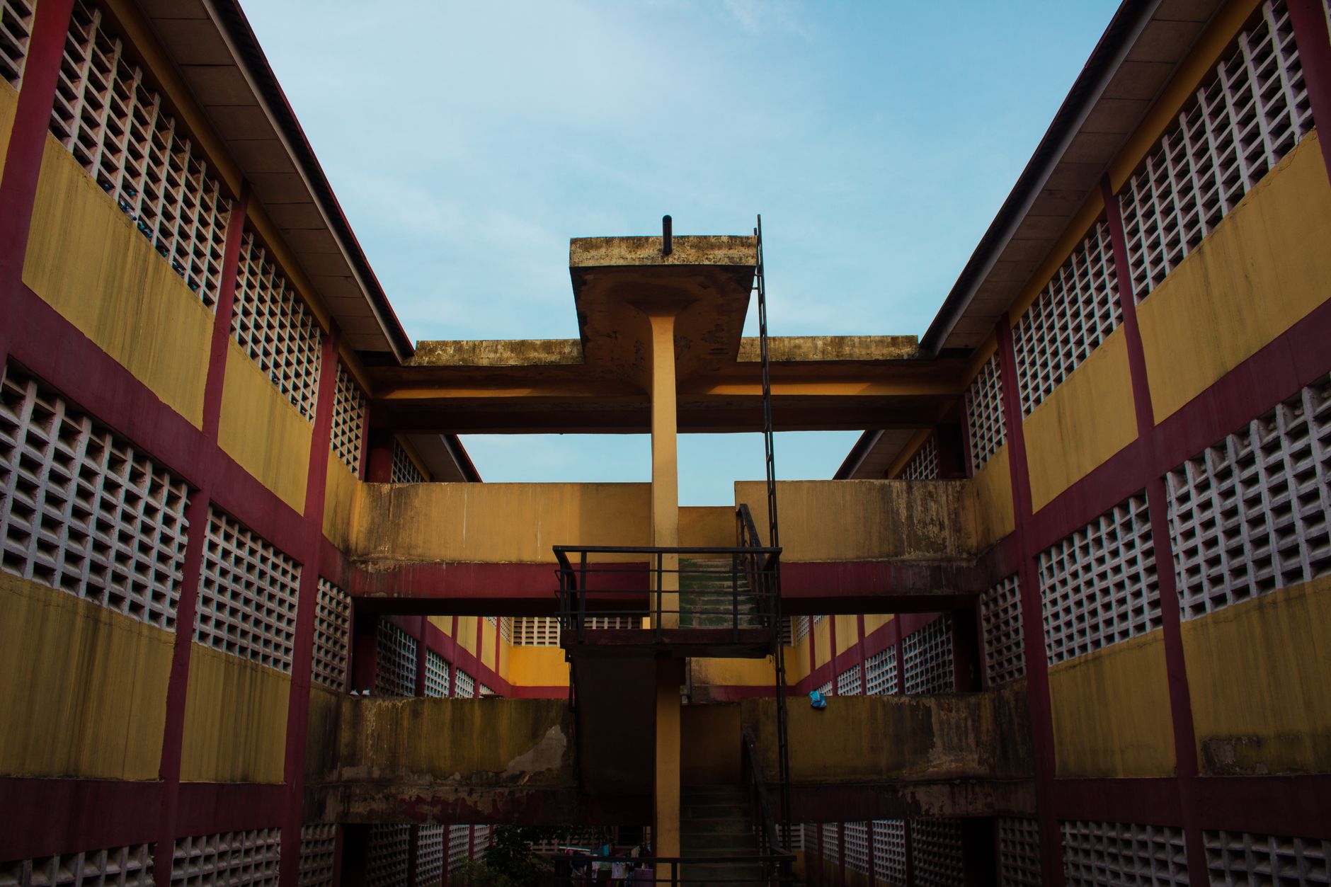Colorful architectural design of a public building in Lagos, showcasing geometric patterns and vibrant hues.