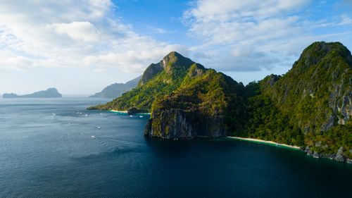 Free Breathtaking aerial view of El Nido, Philippines with lush islands and azure waters under a clear sky. Stock Photo