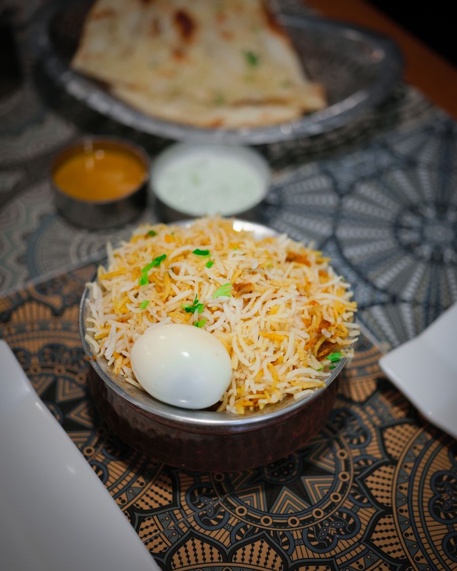 Biryani with boiled egg and naan