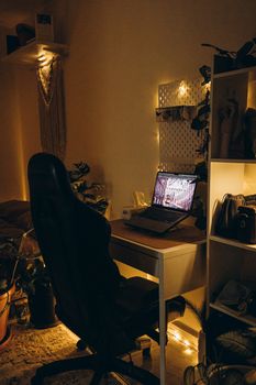 Warm and cozy home office setup with ambient lighting and organic decor