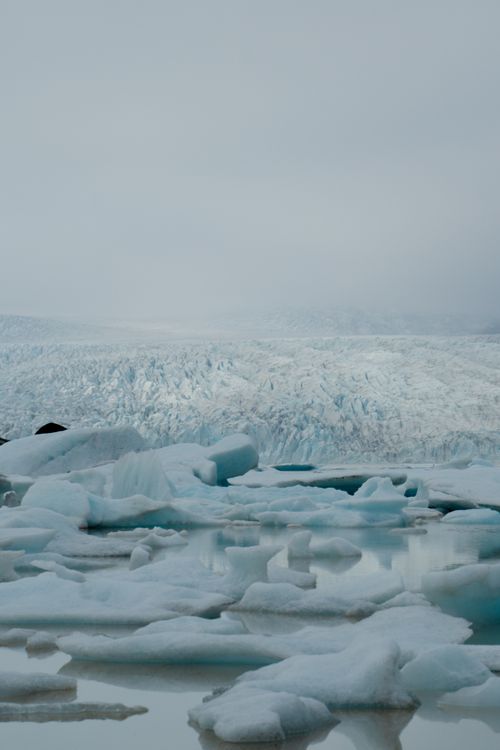 Free Explore the serene beauty of Iceland's glaciers and icebergs, showcasing nature's icy wonders. Stock Photo