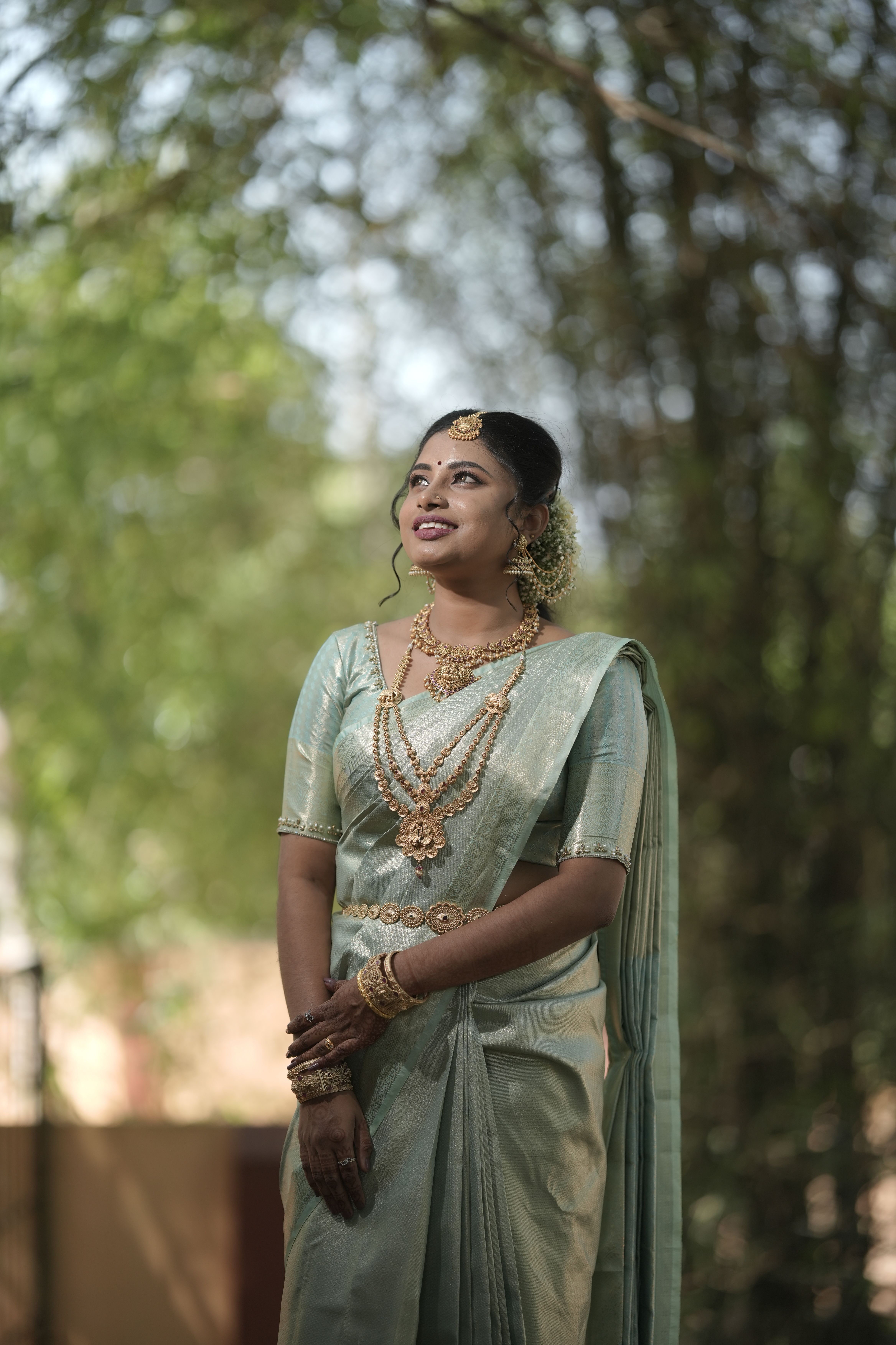 Elegant Indian Woman in Traditional Saree Outdoors · Free Stock Photo