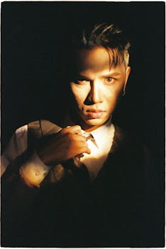 Moody portrait showcasing intense shadow play on a person's face.