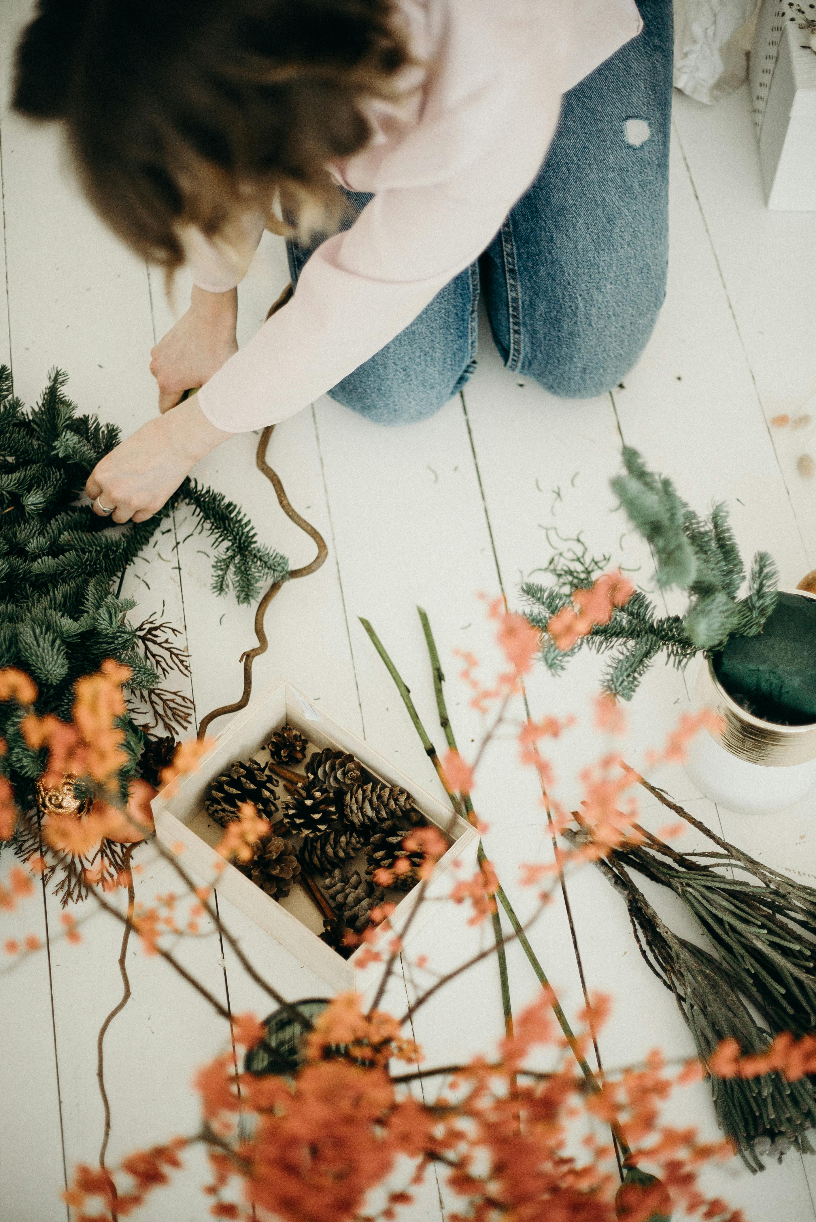 woman preparing some christmas decorations