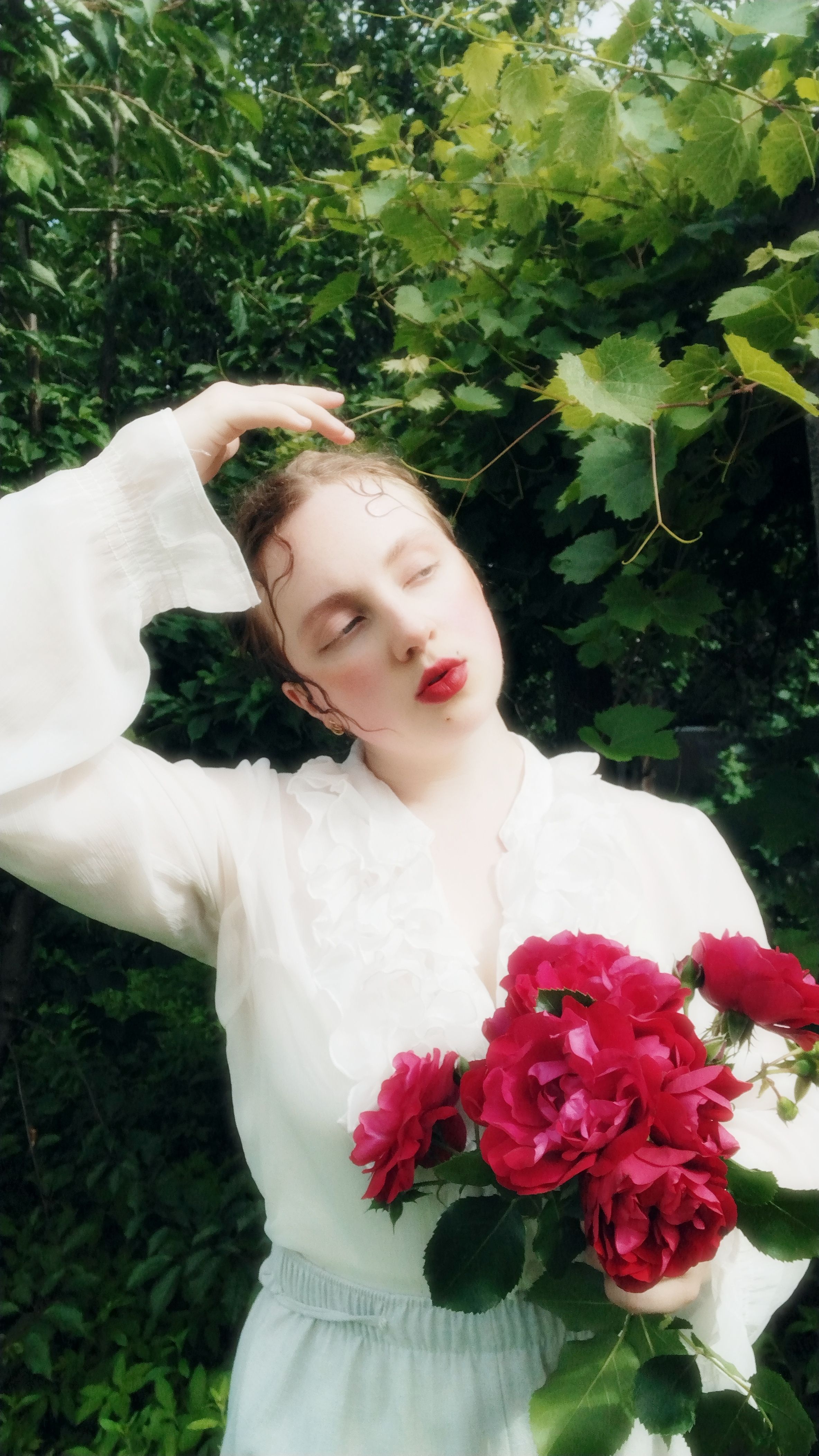 Romantic Portrait of Woman with Red Roses · Free Stock Photo