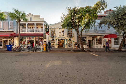Charming shopfronts and bicycles on Duval Street, Key West, Florida, USA.