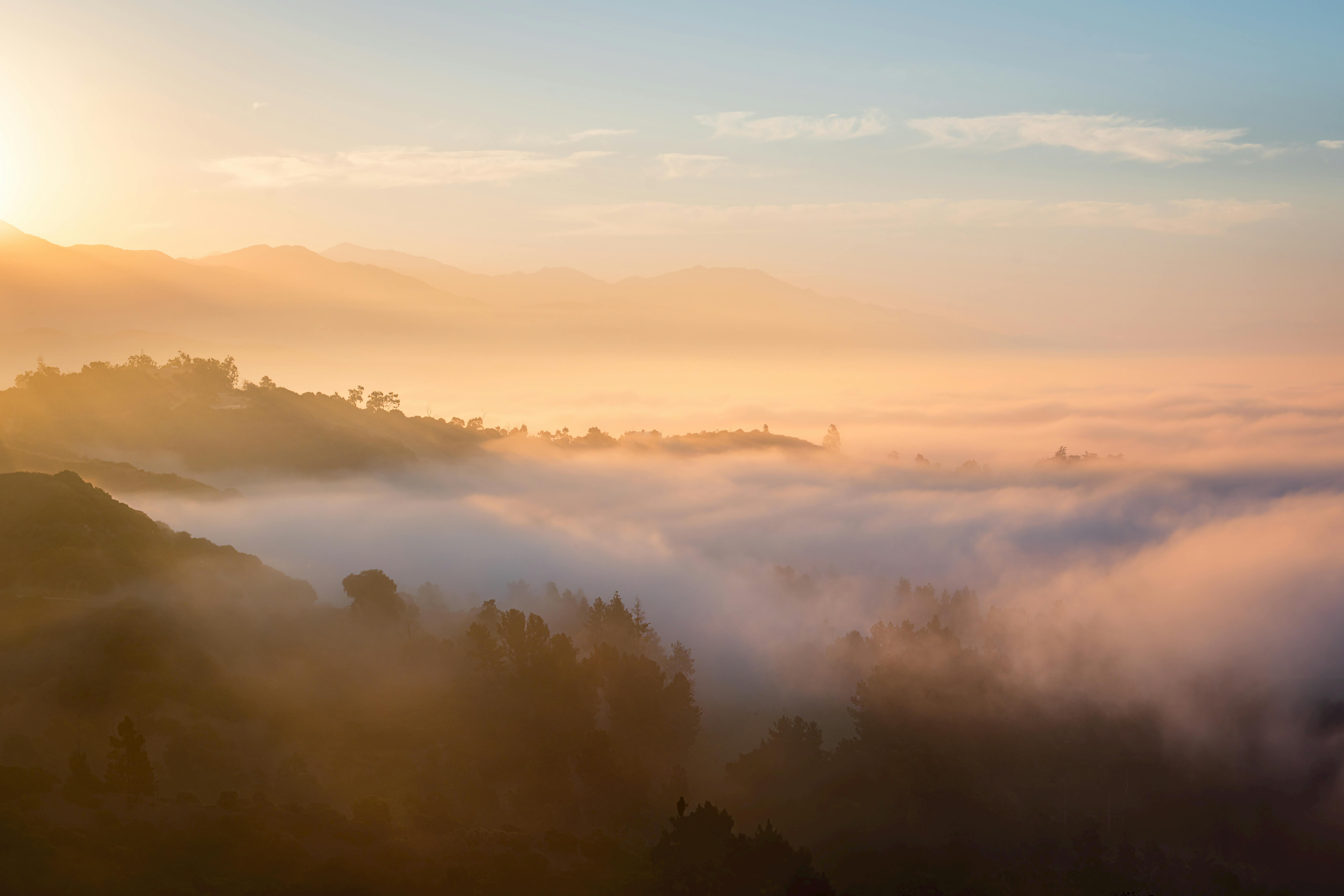 Mystical Foggy Sunrise Over Mountain Landscape · Free Stock Photo