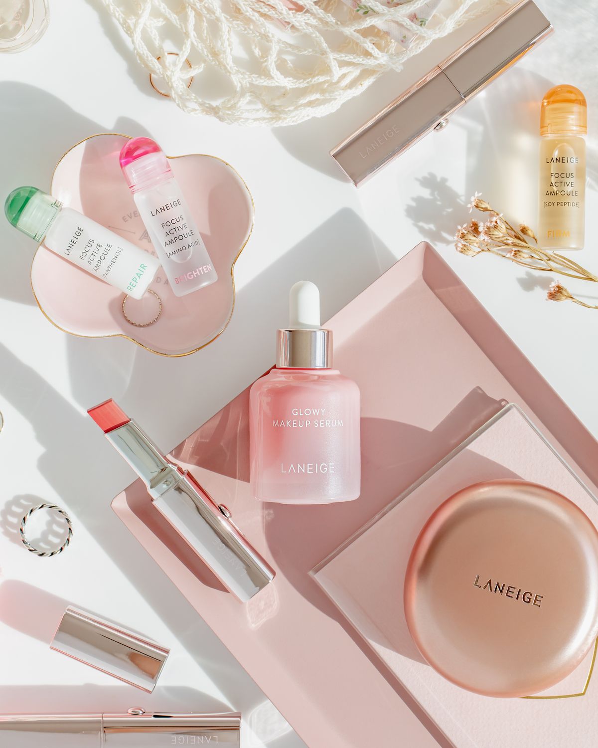 Skincare products in an elegant flat lay