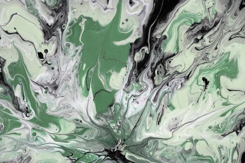 Free A captivating abstract fluid art piece featuring swirling green and black patterns. Stock Photo
