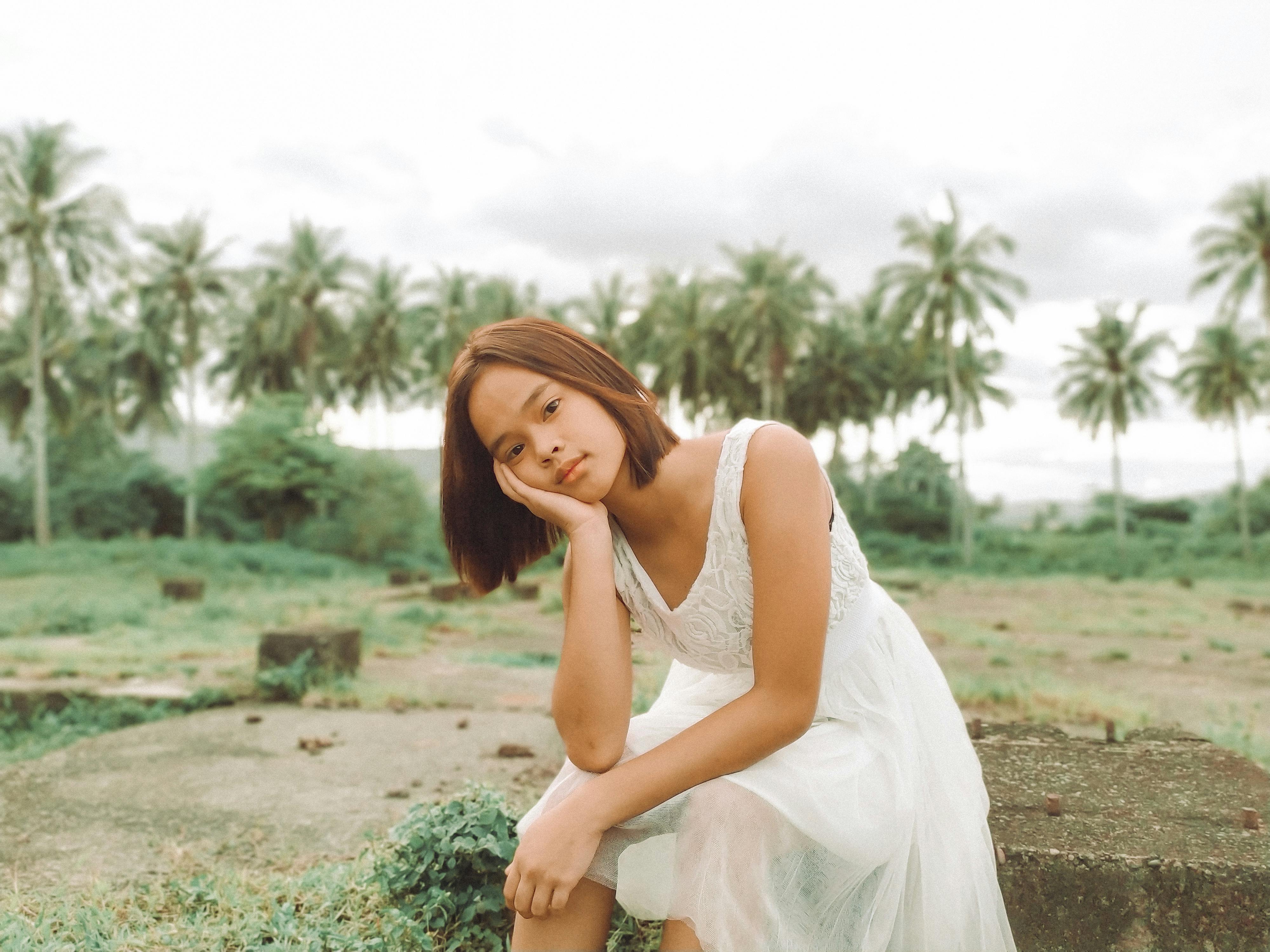 girl wearing white dress