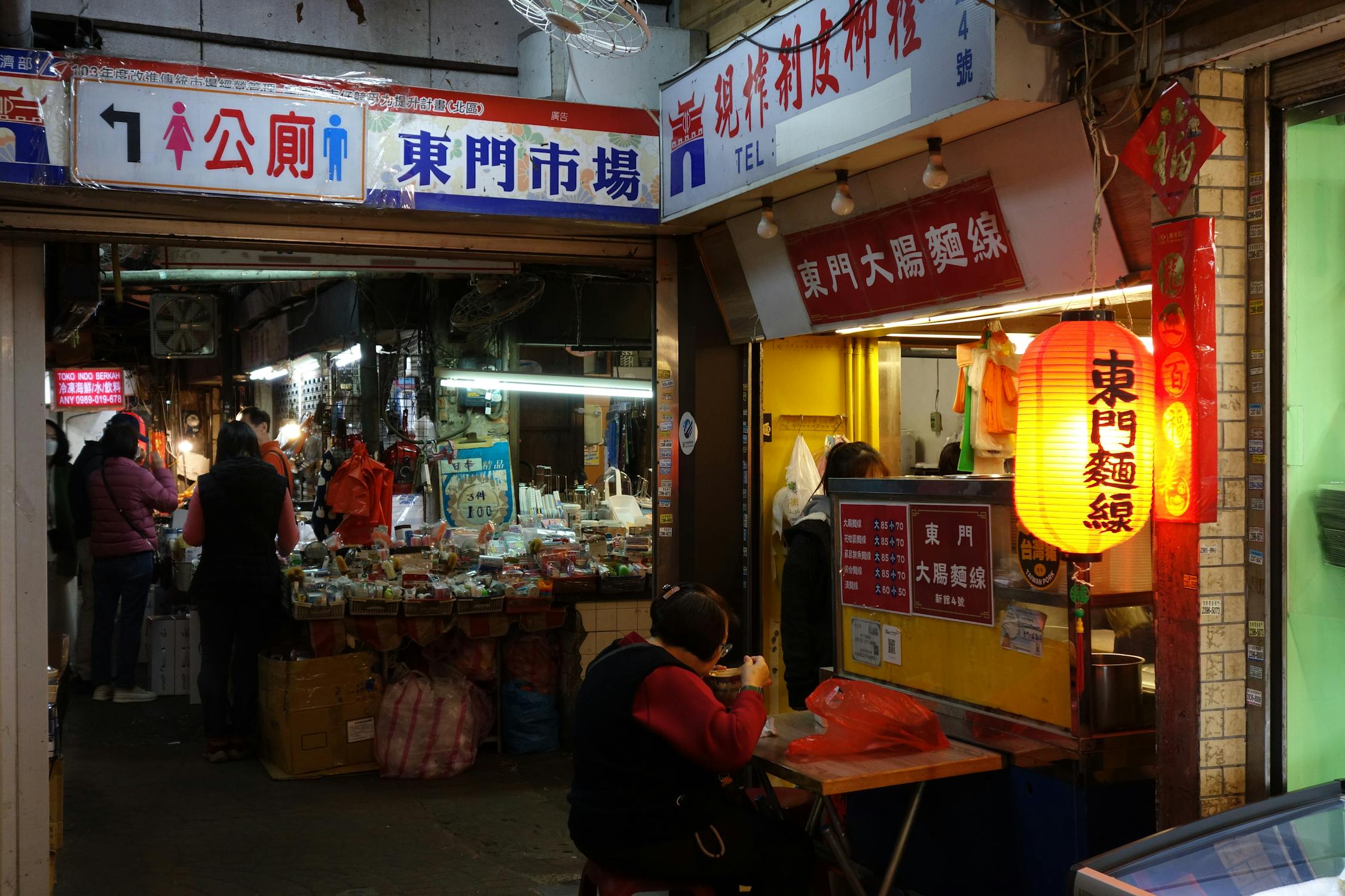 Bustling Night Market Scene with Vendors