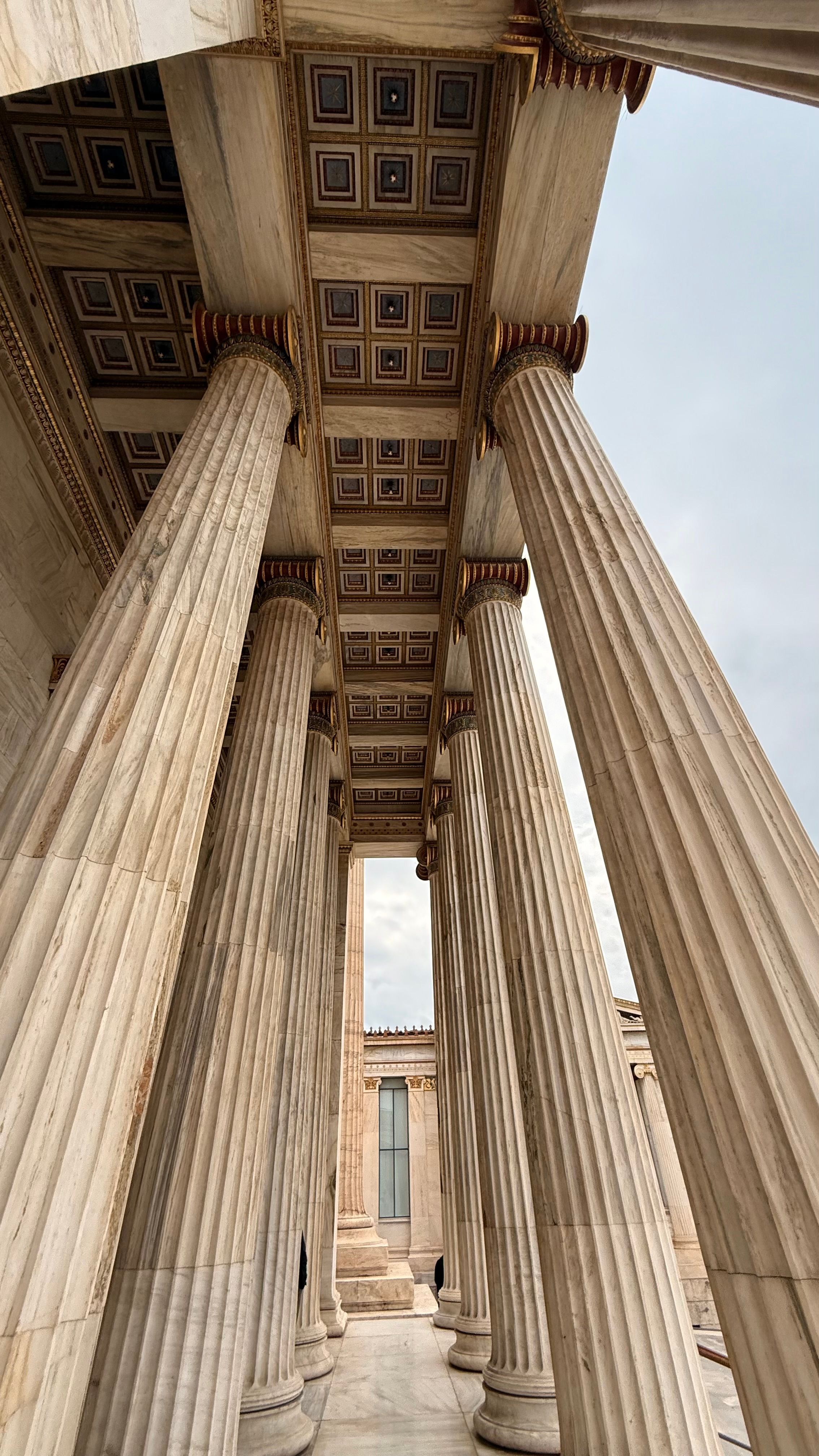 Majestic Greek Columns in Historical Setting · Free Stock Photo