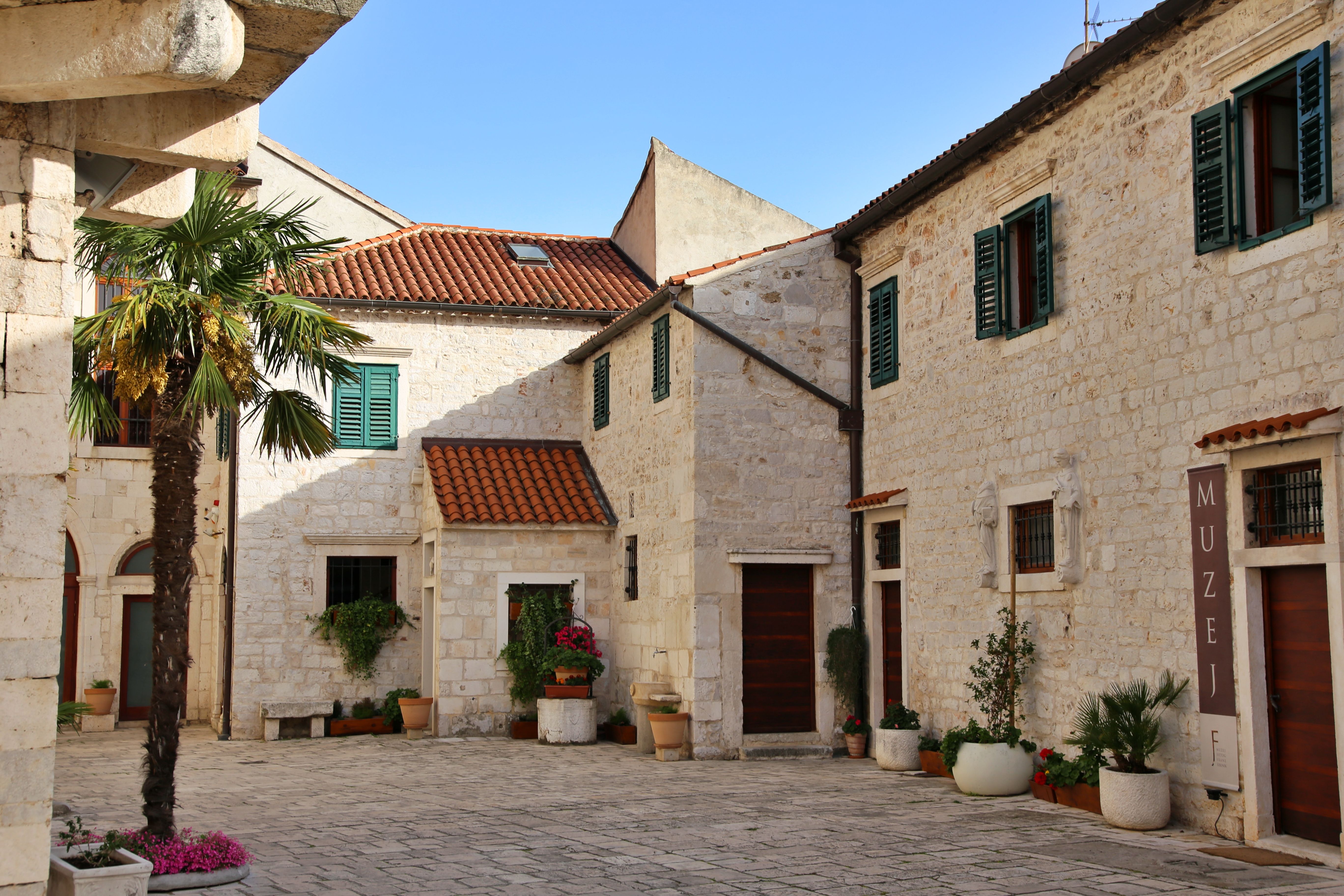 Charming Mediterranean Courtyard in Croatia · Free Stock Photo