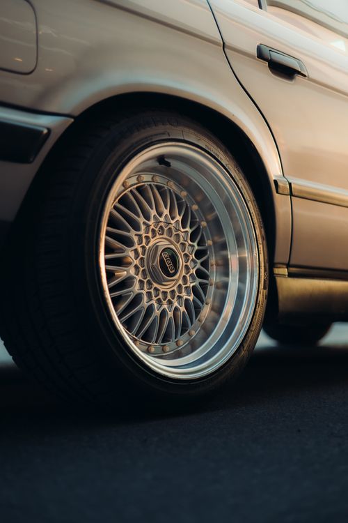 Carved Rims Close-Up of Vintage Car Wheel Rim Design · Free Stock Photo