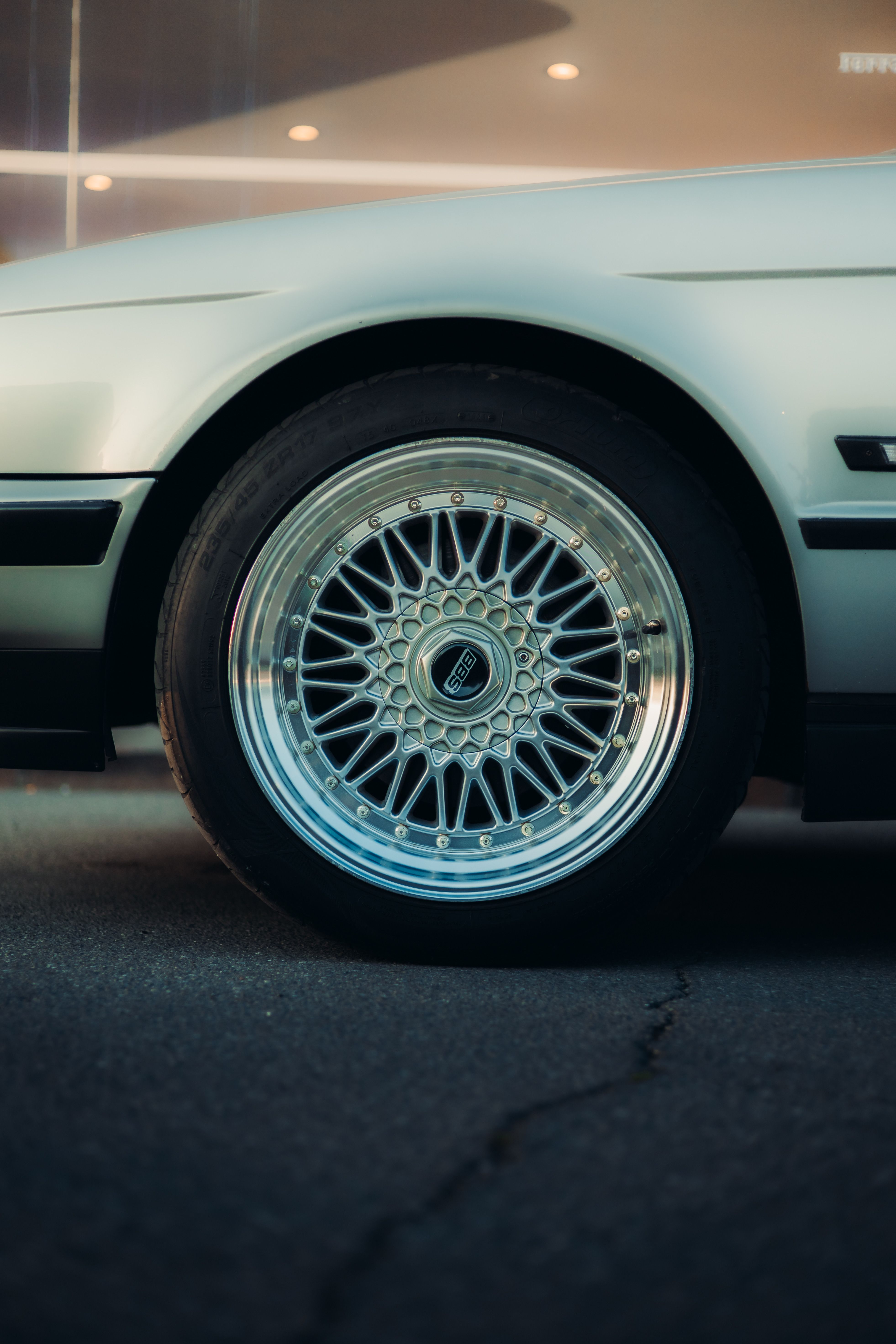 Close-Up of a Classic Car Wheel with Alloy Rim · Free Stock Photo